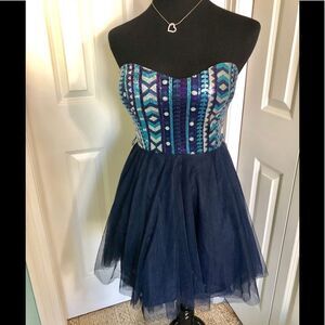 Beautiful strapless dress by Teeze me